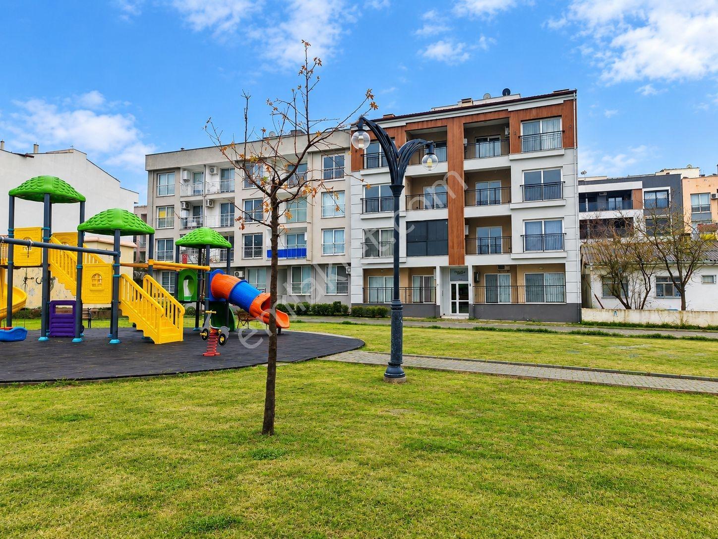 Kuşadası Davutlarda Merkezi Lokasyonda 2+1 Ara Kat Satılık Daire