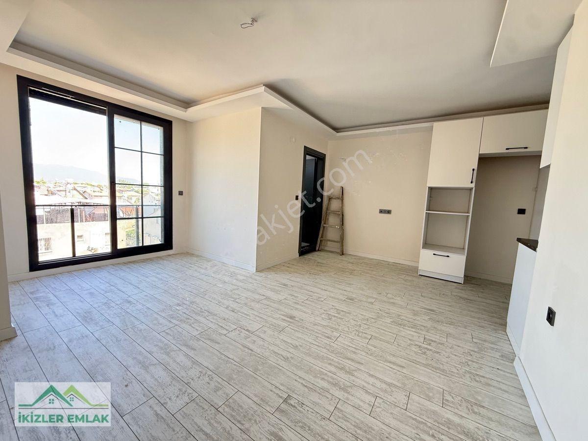 Seferihisar Doğanbey’de Satılık 1 + 1 Deniz Tarafında Satılık Daire