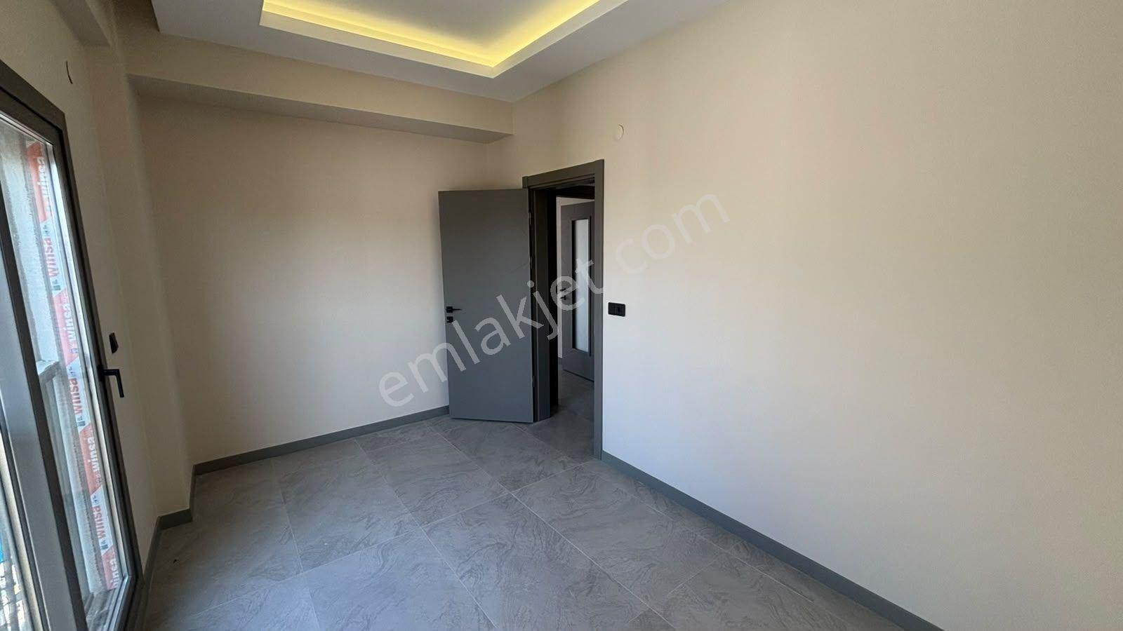 Kuşadası Davutlar'da Satılık 1+1 | Ormana Komşu Havuzlu Site — fotoğraf 18