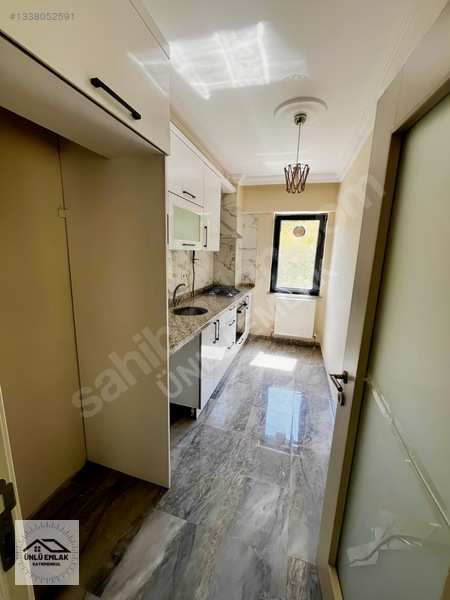 Ünlü Emlak'tan Kiralık 2+1 Daire — fotoğraf 9