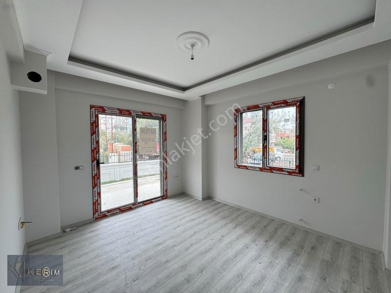 Kerim'den Küçükkuyu Merkez'de Bahçe Katı 2+1 Satılık Daire — fotoğraf 2