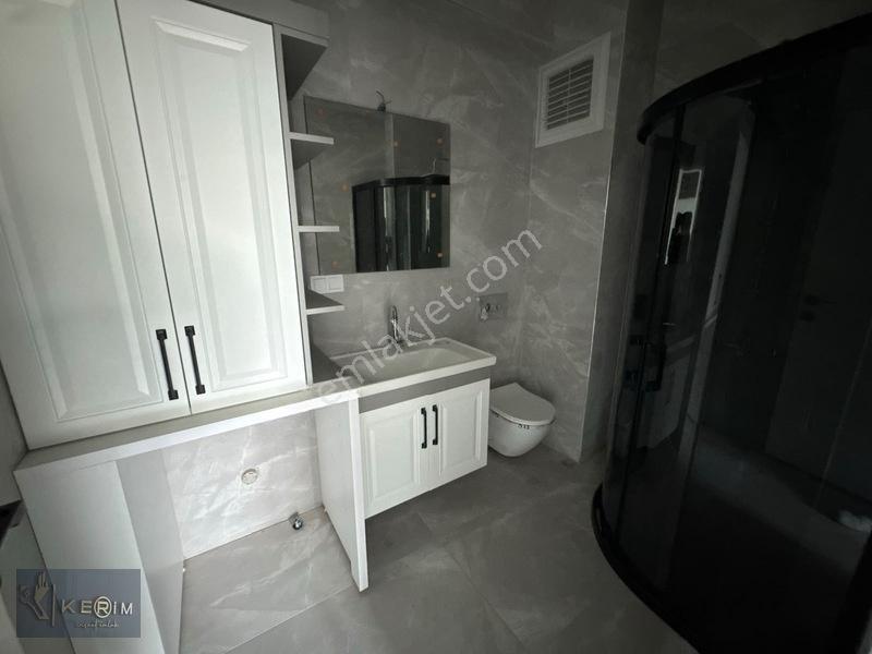 Kerim'den Küçükkuyu Merkez'de Bahçe Katı 2+1 Satılık Daire — fotoğraf 18