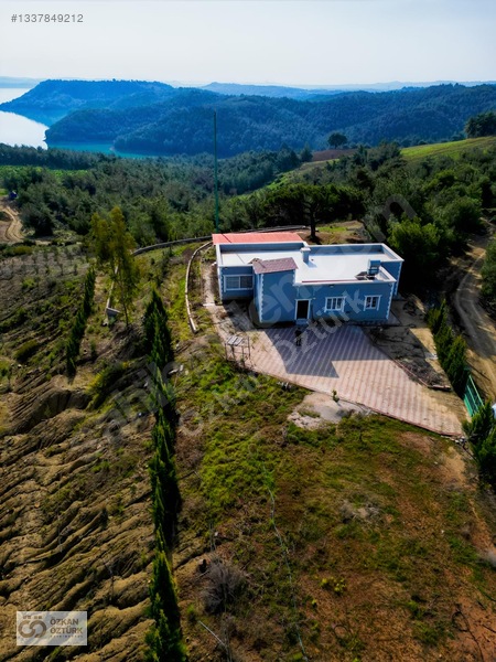 Özkan Öztürk'ten Doğanın Ortasında Muhteşem Göl Manzaralı Villa — fotoğraf 3