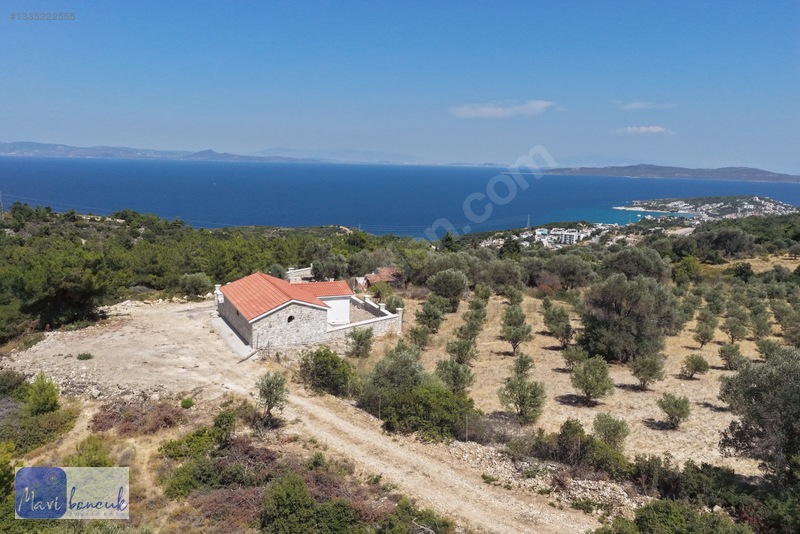 Mavi Boncuk'tan Mordoğanda Deniz Manzaralı Tarla — fotoğraf 13