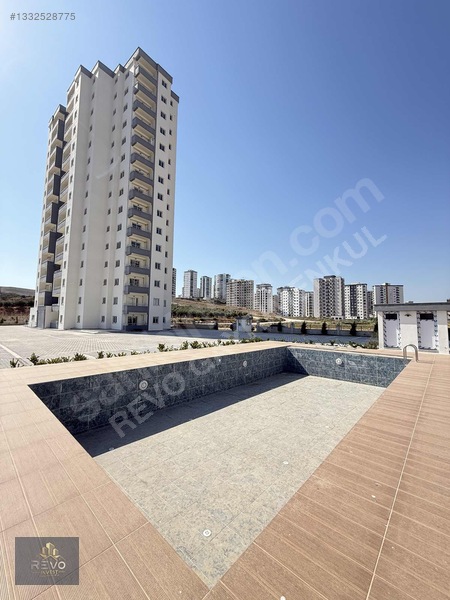 Revo'dan 2+1 Geniş Oturumlu Sıfır İskanlı Havuzlu Satılık Daire