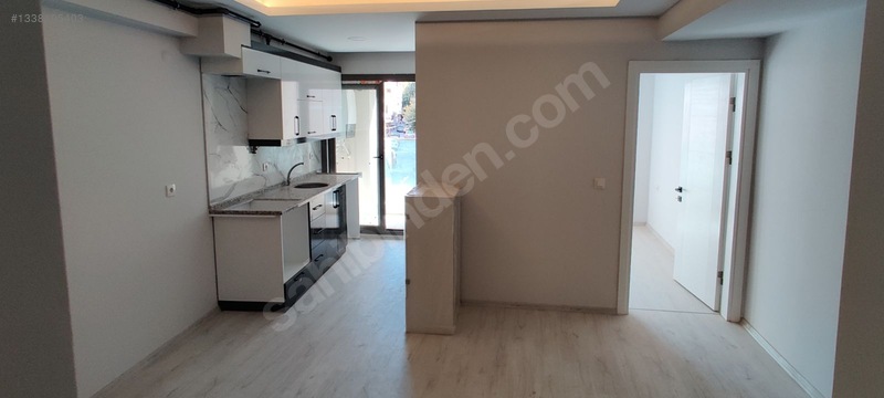 Buca Merkezde Satılık 1+1 Ara Kat Daire — fotoğraf 3