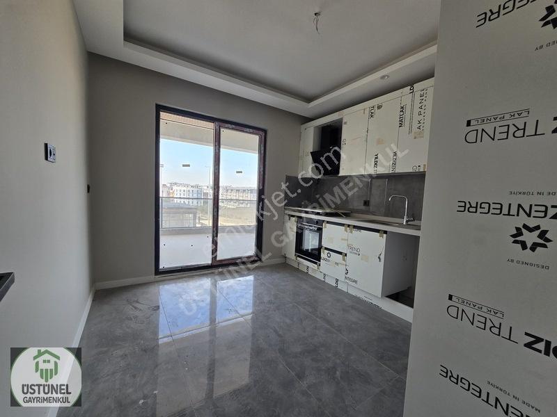 Üstünel'den Yüksek Kredili Geniş M2'li Arakat Satılık Daire — fotoğraf 15