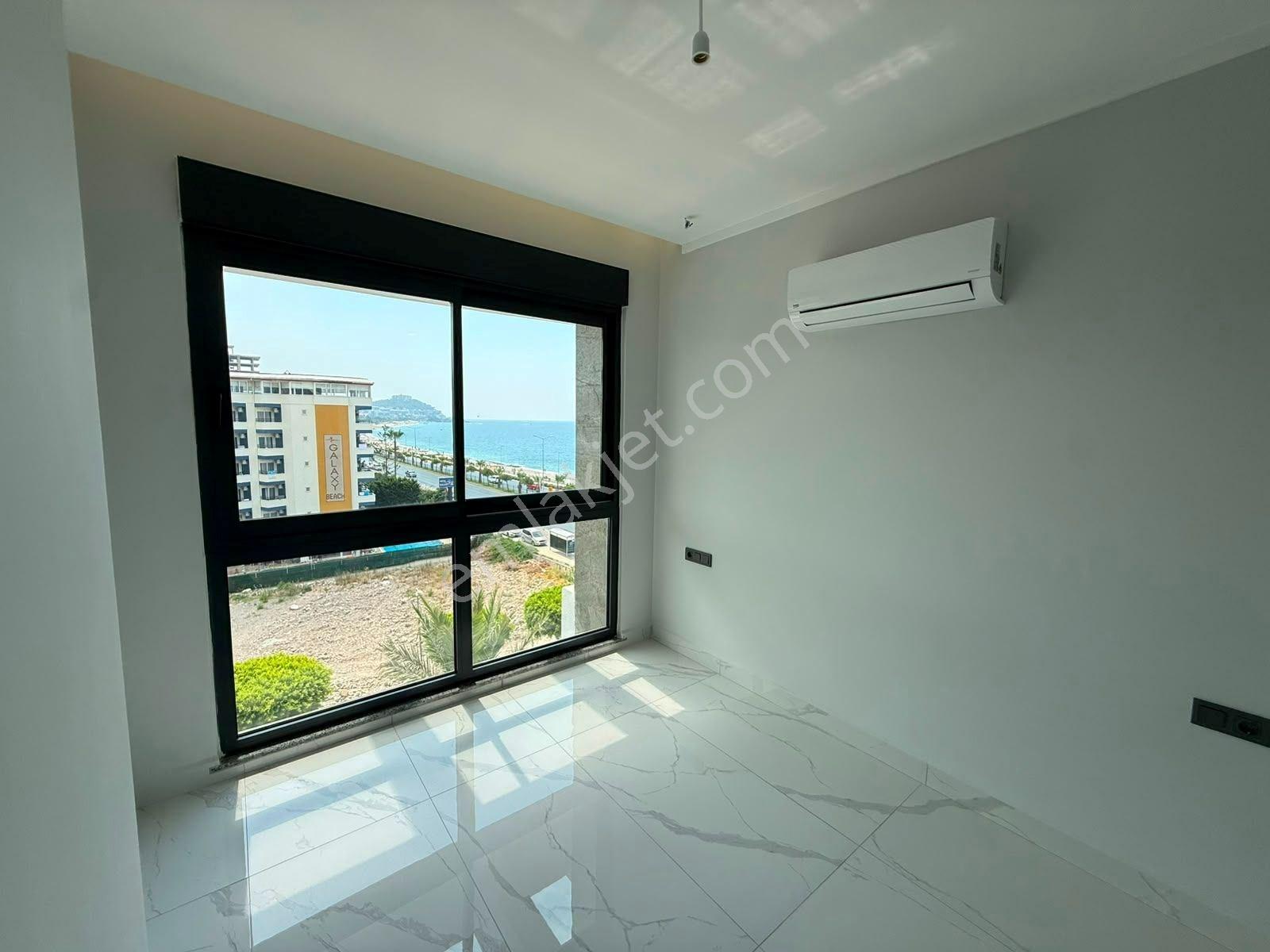 Alanya Mahmutlar’da Denize Sıfır Ön Cephe Panoramik Deniz Manzaralı 2+1 Daire — fotoğraf 8