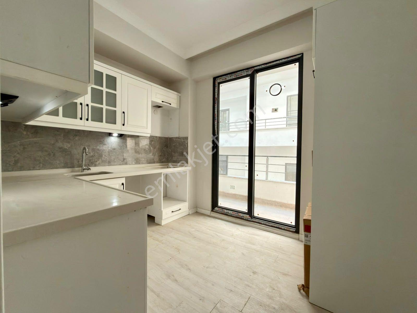 Yüksel'den Tuzcumurat'ta Cam Balkonlu Arakat Sıfır 2+1 Daire — fotoğraf 4