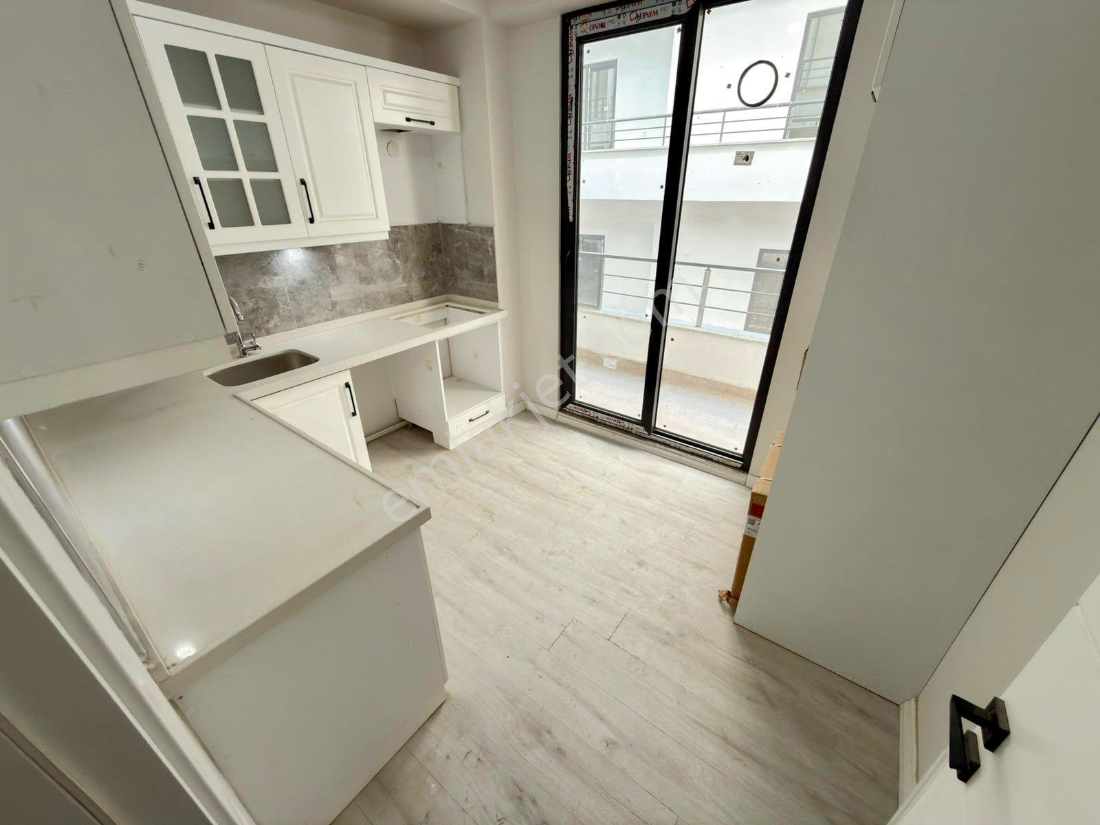 Yüksel'den Tuzcumurat'ta Cam Balkonlu Arakat Sıfır 2+1 Daire — fotoğraf 5