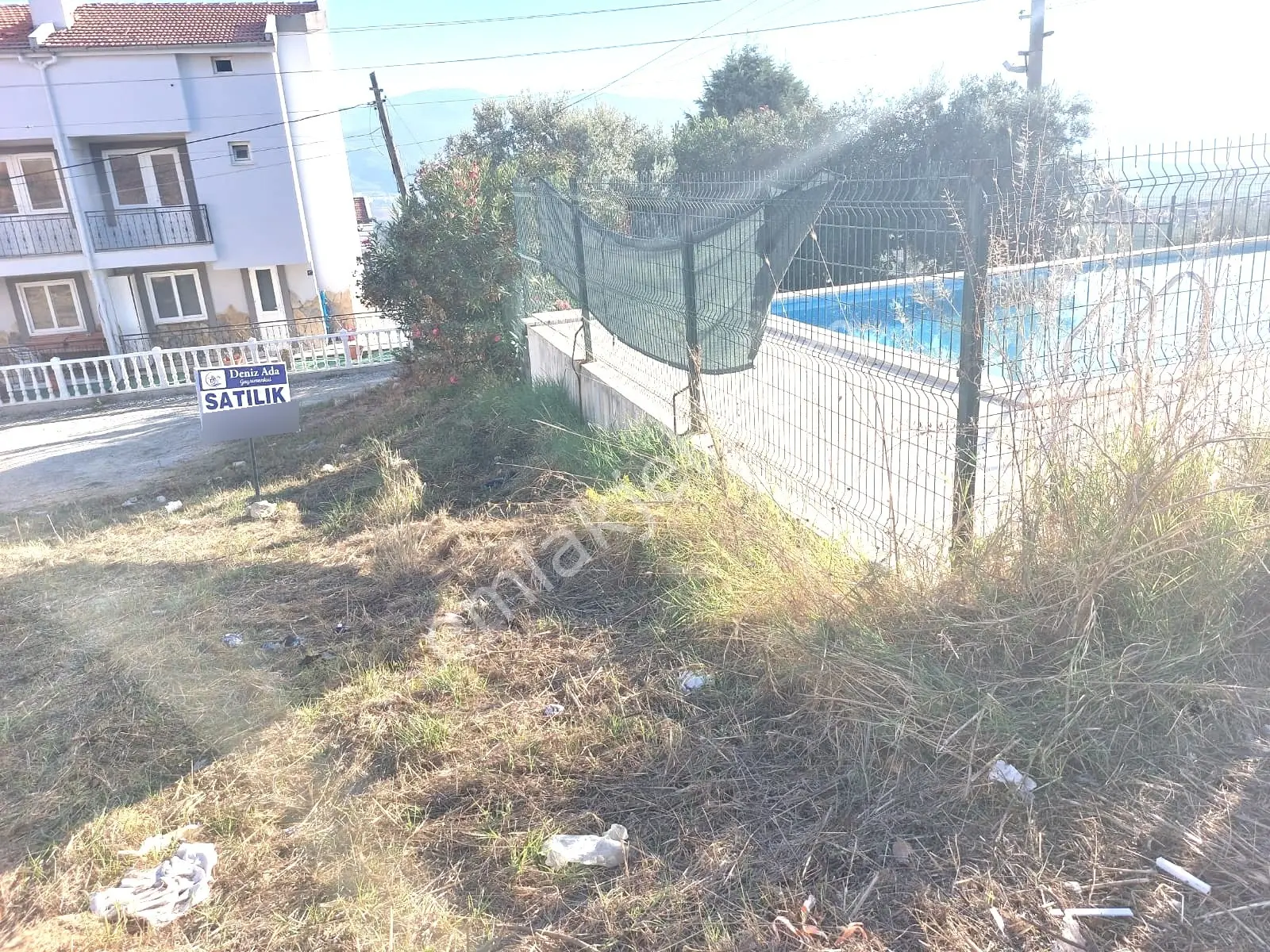 Kuşadası Soğucak'ta Köy İçinde Deniz Manzaralı Satılık Arsa — fotoğraf 4
