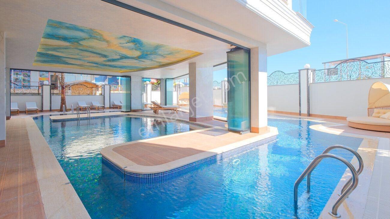 Alanya Merkezde Denize Sıfır Deniz Manzaralı 3+1 Satılık Daire — fotoğraf 30