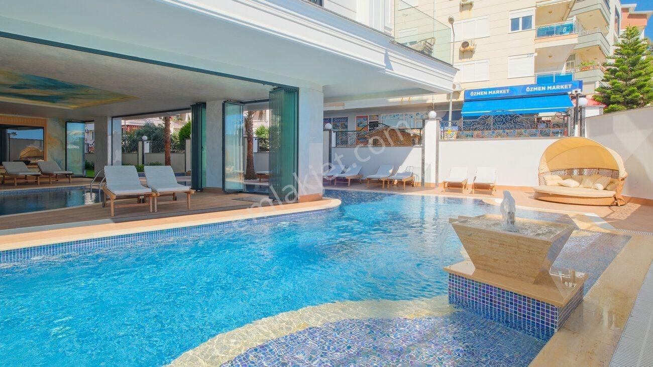 Alanya Merkezde Denize Sıfır Deniz Manzaralı 3+1 Satılık Daire — fotoğraf 31