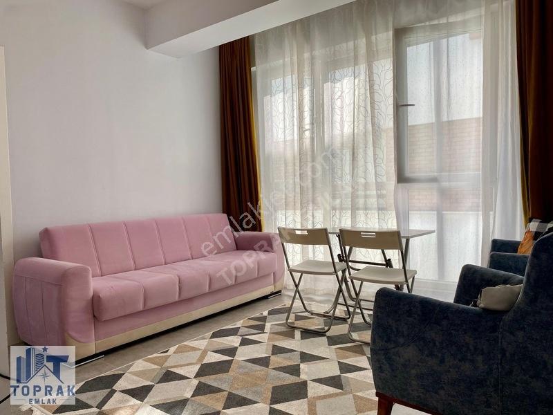 Toprak Emlak'tan Cadde Üzeri / Ara Kat / Kiracılı / Satılık 1+1 — fotoğraf 4