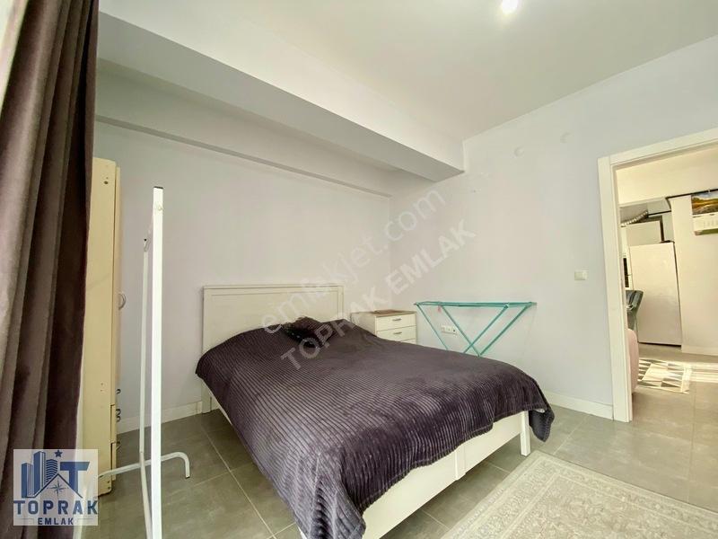 Toprak Emlak'tan Cadde Üzeri / Ara Kat / Kiracılı / Satılık 1+1 — fotoğraf 10