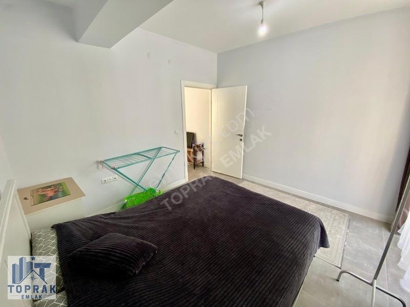 Toprak Emlak'tan Cadde Üzeri / Ara Kat / Kiracılı / Satılık 1+1 — fotoğraf 11