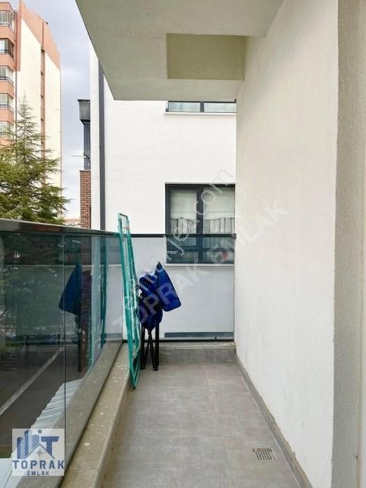Toprak Emlak'tan Cadde Üzeri / Ara Kat / Kiracılı / Satılık 1+1 — fotoğraf 12