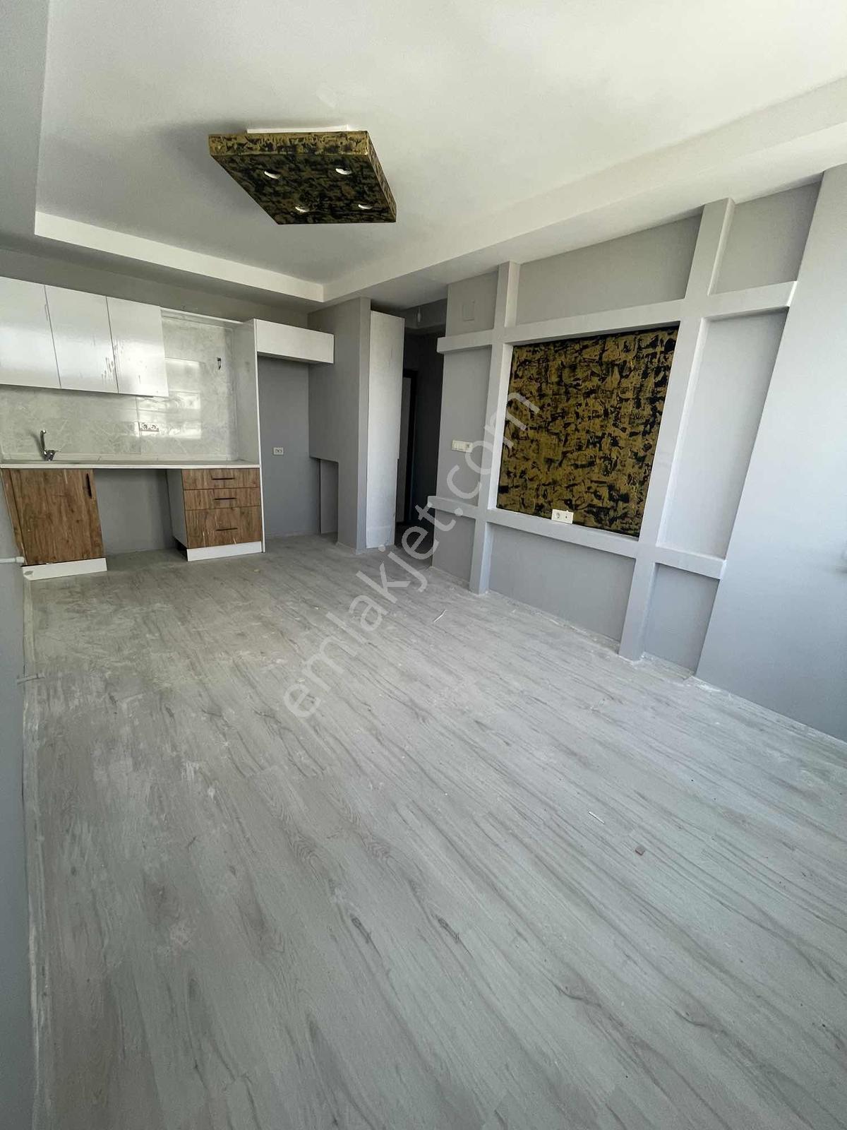 Üniversite~yanı~1+1~sıfır~caddeye~1~parsel~yatırımlık~cazip~