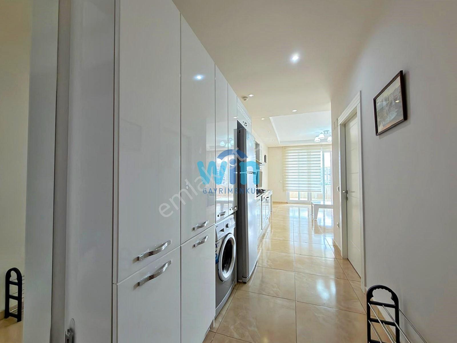 Win'den Çeşmeli Liparis Suncity'de Deniz Manzaralı Satılık 1+1 — fotoğraf 3