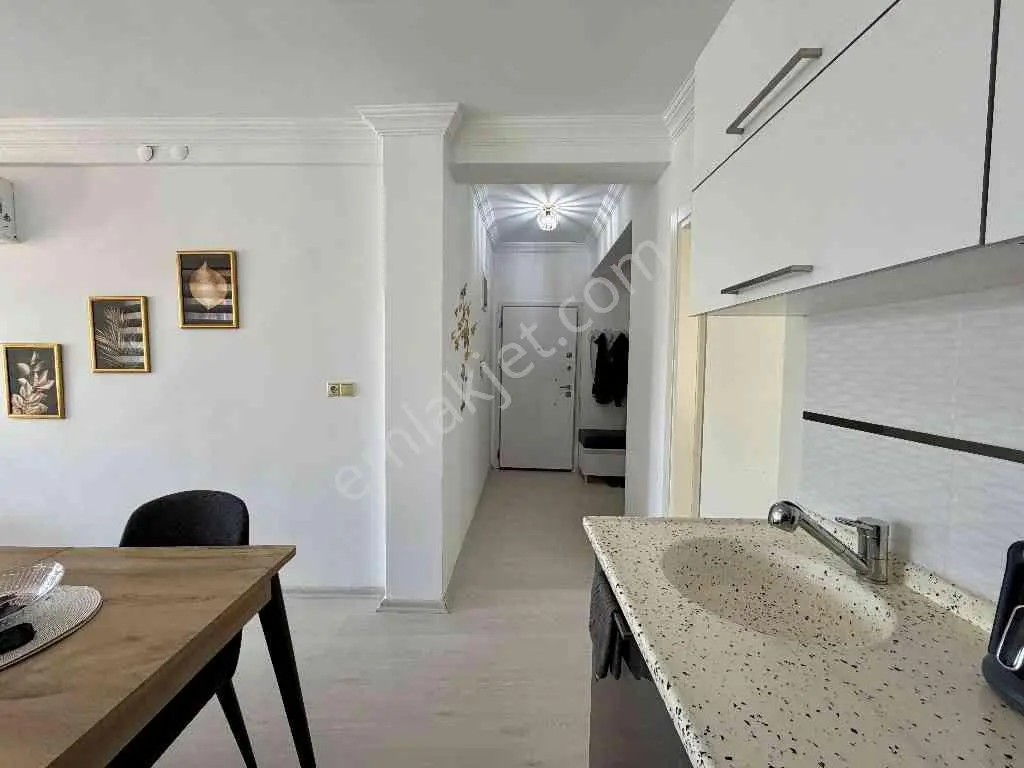 Kuşadasında Güvenlikli Site İçerisinde Deniz Manzaralı 1+1daire — fotoğraf 34