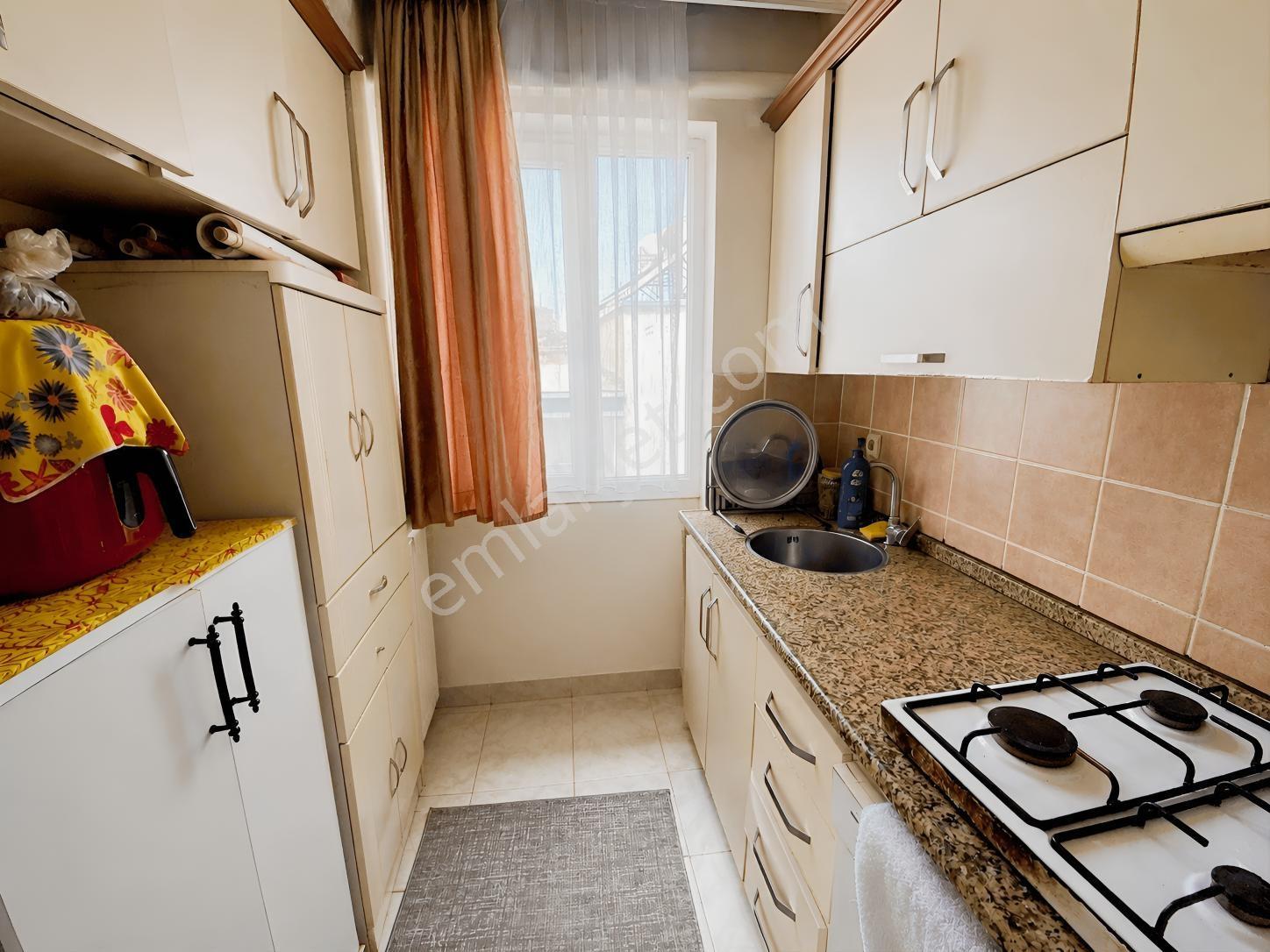 Bozyaka'da Merkezi Konumda 2+1 Satılık Daire — fotoğraf 24