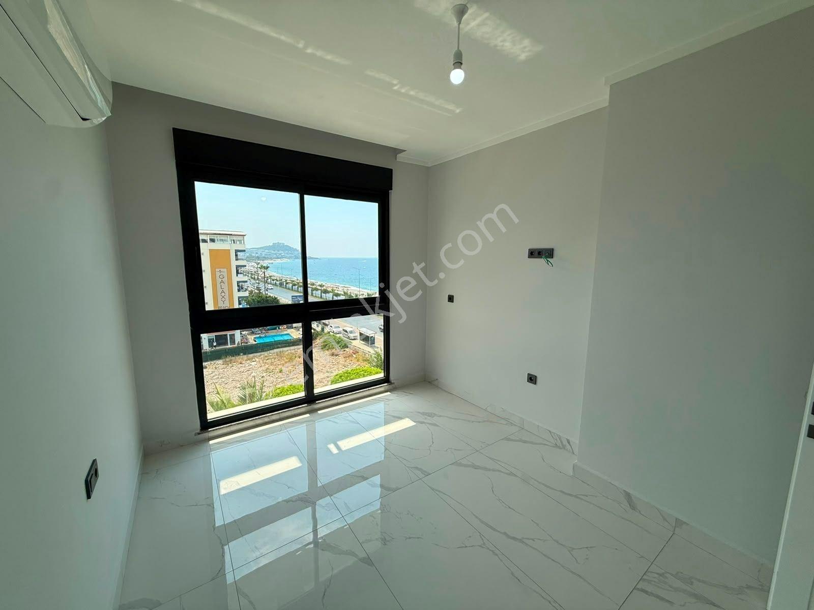 Alanya Mahmutlar’da Denize Sıfır Ön Cephe Panoramik Deniz Manzaralı 2+1 Daire — fotoğraf 5