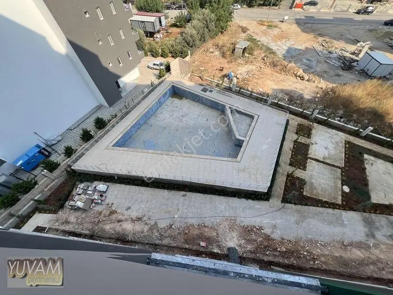 Yuvam'dan Tömükte Satılık Havuzlu Sitede 1+1 — fotoğraf 7