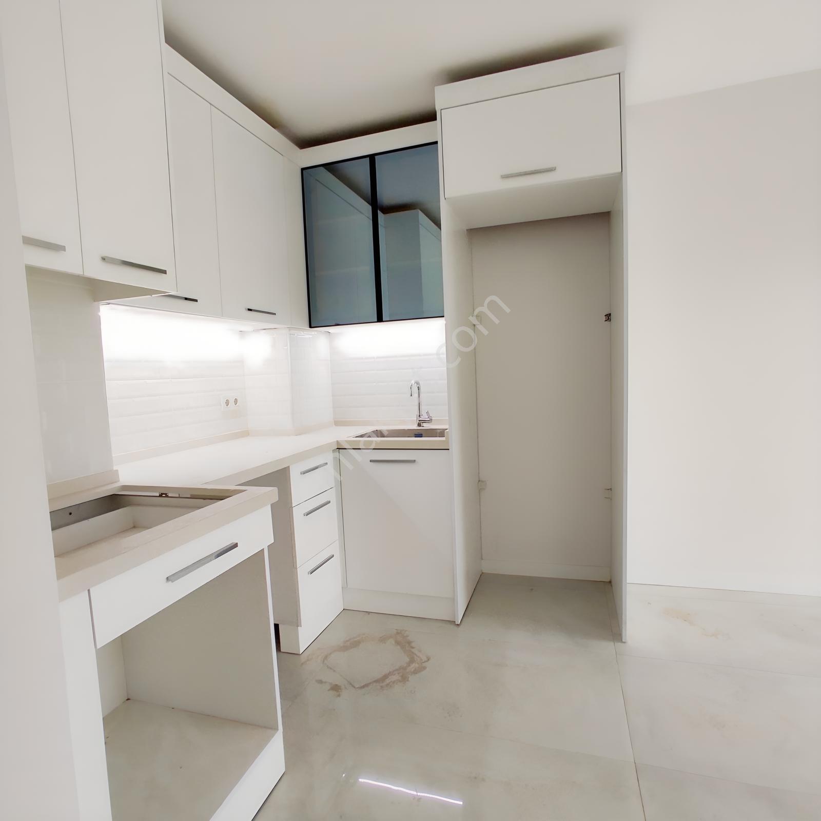 Bayraklı ,adalet Mahallesi'nde Satılık 1+1 Sıfır Daire — fotoğraf 12