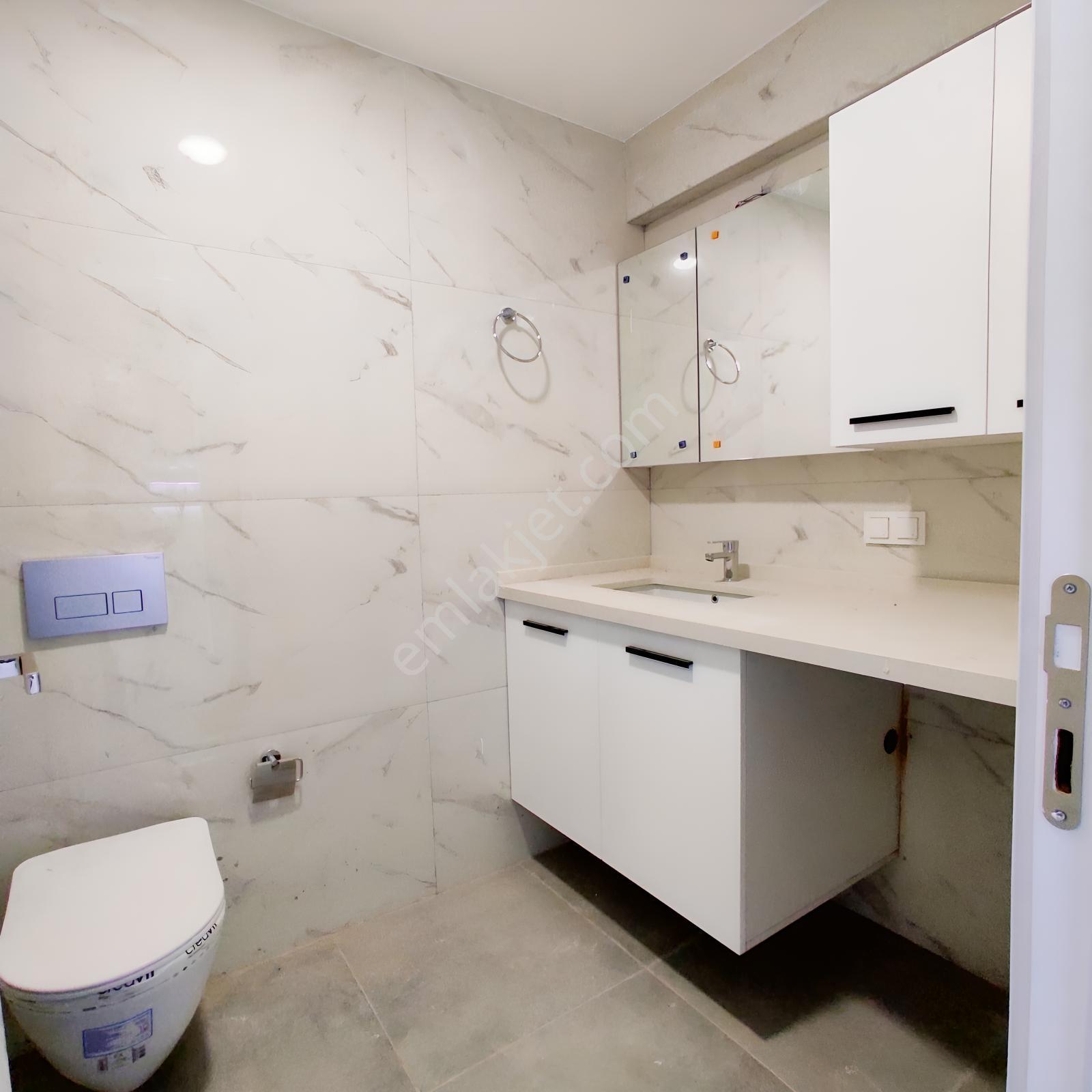 Bayraklı ,adalet Mahallesi'nde Satılık 1+1 Sıfır Daire — fotoğraf 14