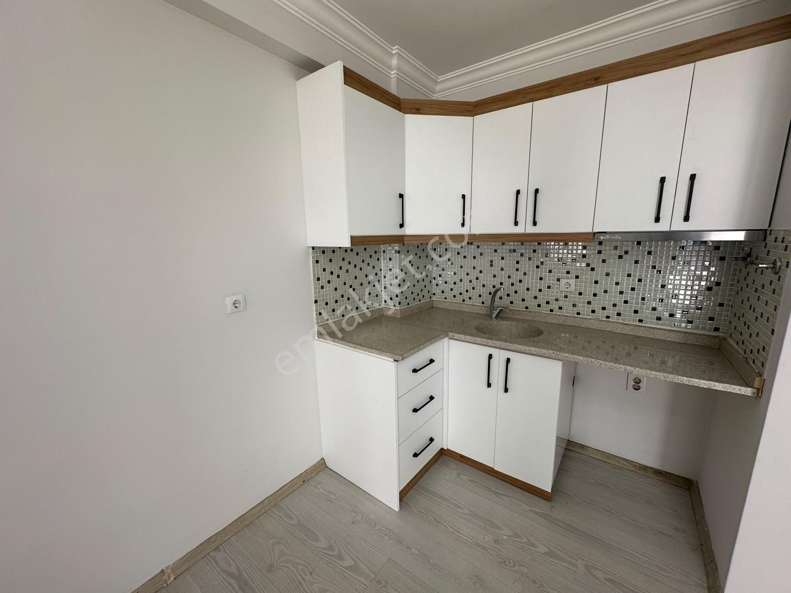 Kostak Gayrimenkul'den Akçay Merkez'de Özel Kullanımlı 2+1 Daire — fotoğraf 2