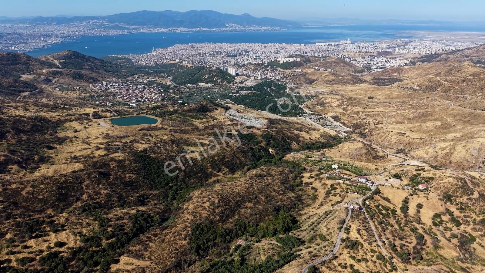 38 İzmir Bayraklı Doğançay'da Yola Cepheli 60 Dönüm Satılık Arsa — fotoğraf 9