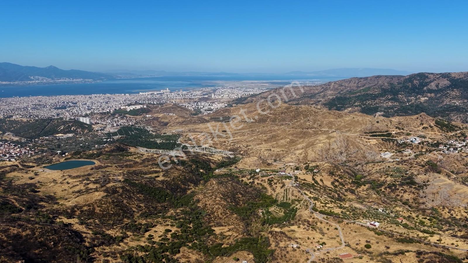 38 İzmir Bayraklı Doğançay'da Yola Cepheli 60 Dönüm Satılık Arsa — fotoğraf 11