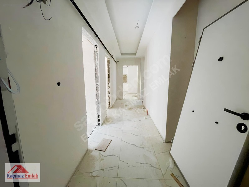 Kaçmaz Emlak'tan Özsüt Arkasında Sıfır 3+1 Satılık Daire — fotoğraf 3