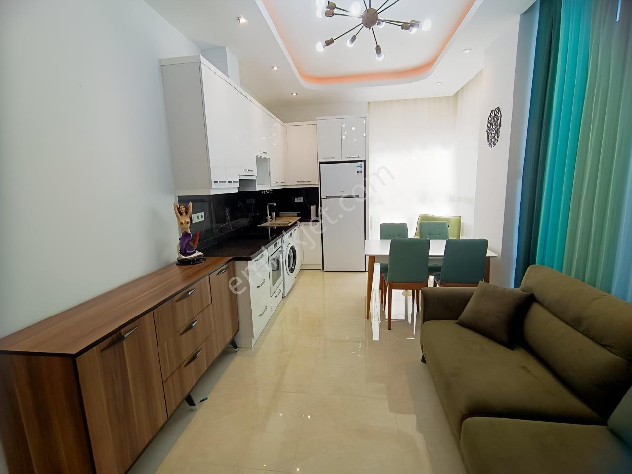 Alanya Mahmutlar'da Kapalı Havuzlu Sitede 2 Balkonlu Eşyalı 1+1 — fotoğraf 2