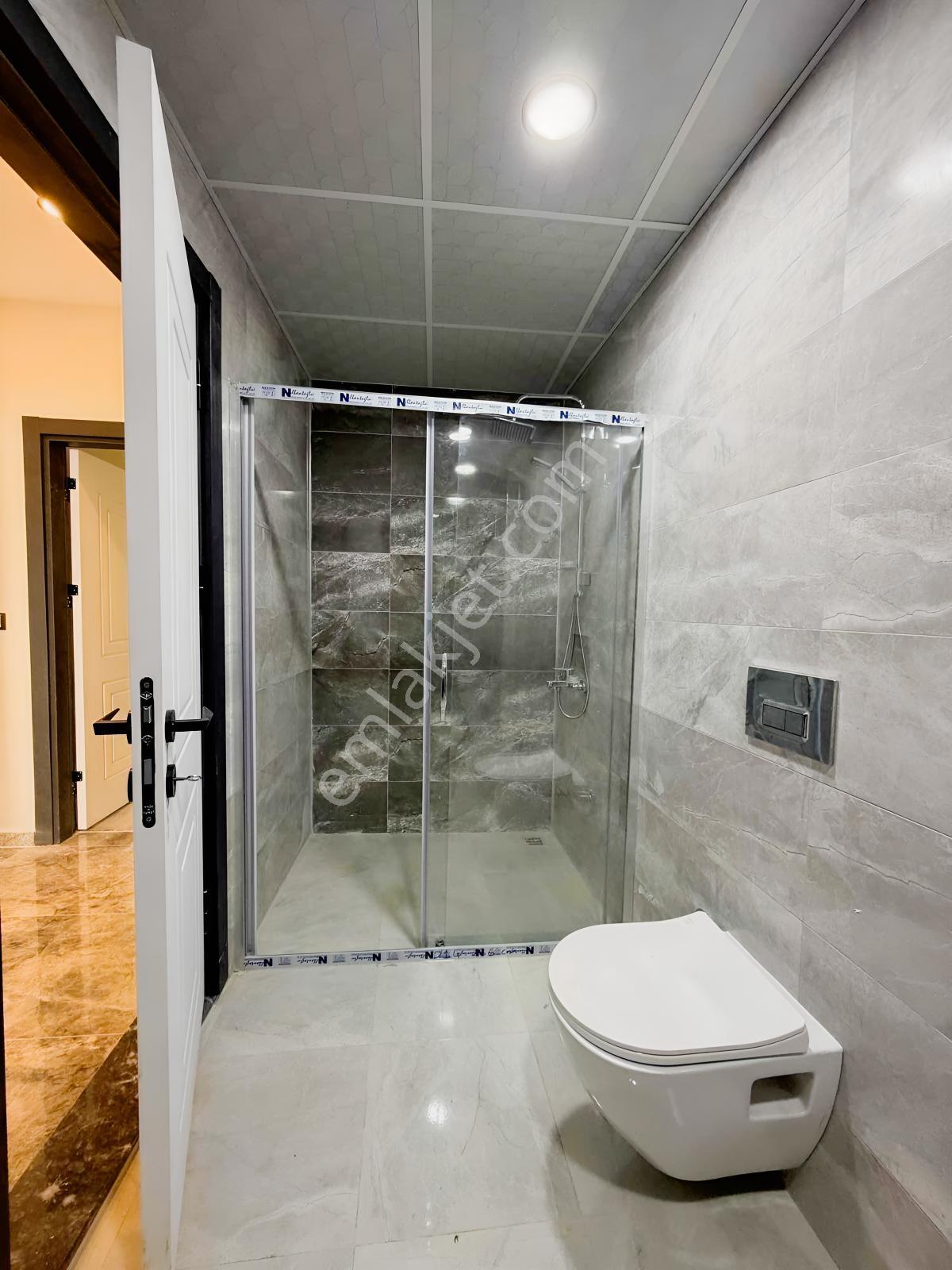 Hsn Emlk'tan Güzelçamlı'da Satılık Sıfır Daire — fotoğraf 24