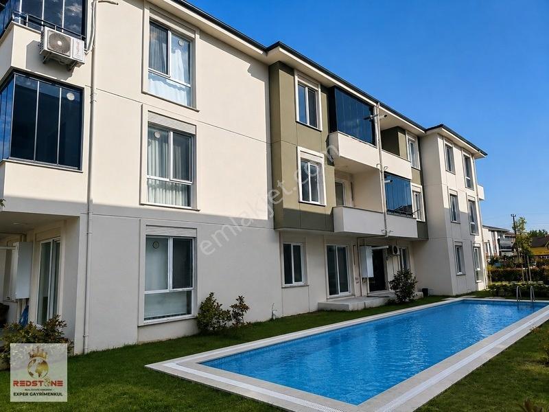 Karasuda Havuzlu Sitede Ara Kat Kombili C. Balkon Geniş 1+1