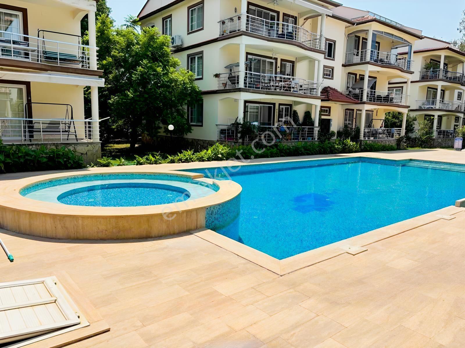Dalaman'da Satılık Havuzlu Sitede Daire — fotoğraf 2